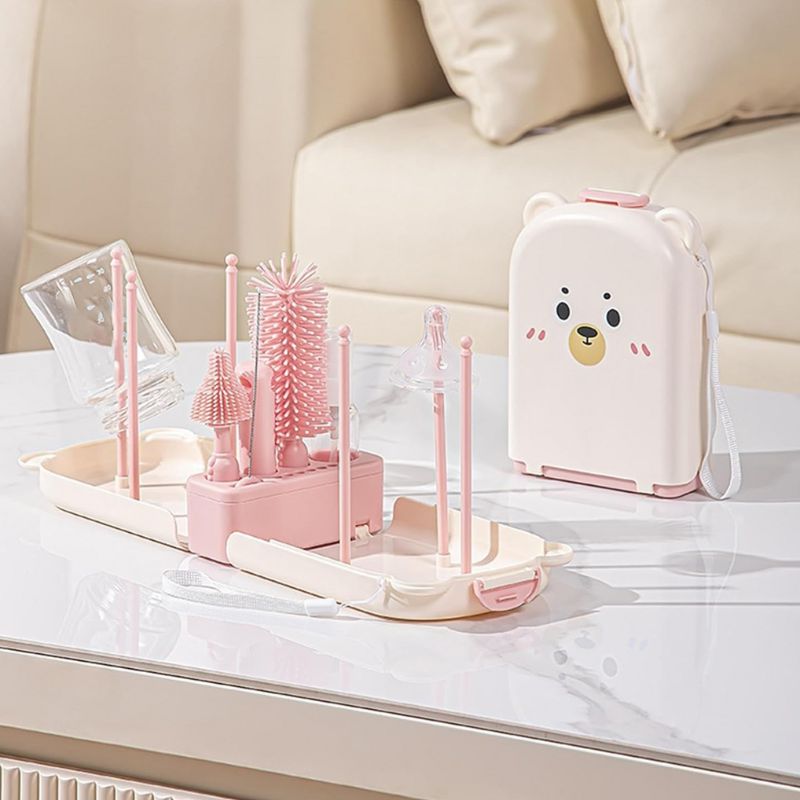 Nettoyeur-de-Biberon-kit-rose-sur-table